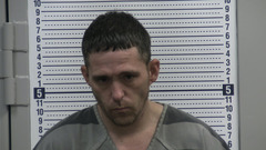 Mugshot of THOMAS, BRIAN